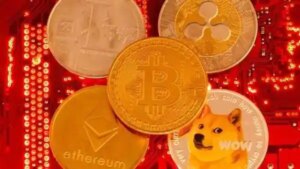 Representations of cryptocurrencies Bitcoin, Ethereum, DogeCoin, Ripple, Litecoin are placed on PC motherboard in this illustration (REUTERS)
