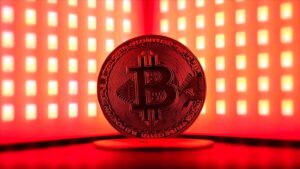 Bitcoin climbs to nearly $65,000 as Fed chair signals interest rate cut