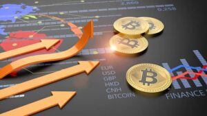 Gold Bitcoins lying on a global finance currency chart with arrows shooting higher.